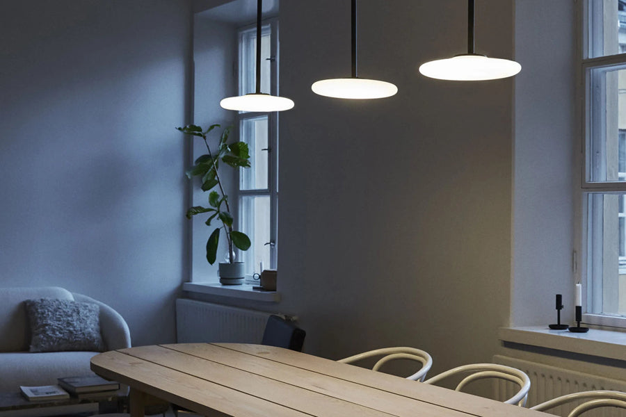 Ihana Pendant/Ceiling Light by Marset, showing closeup view of ihana pendant/ceiling light in live shot.
