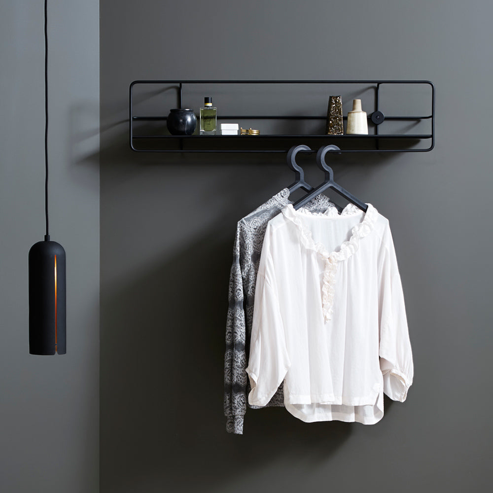 Illusion Hanger by Woud, showing hangers in live shot.