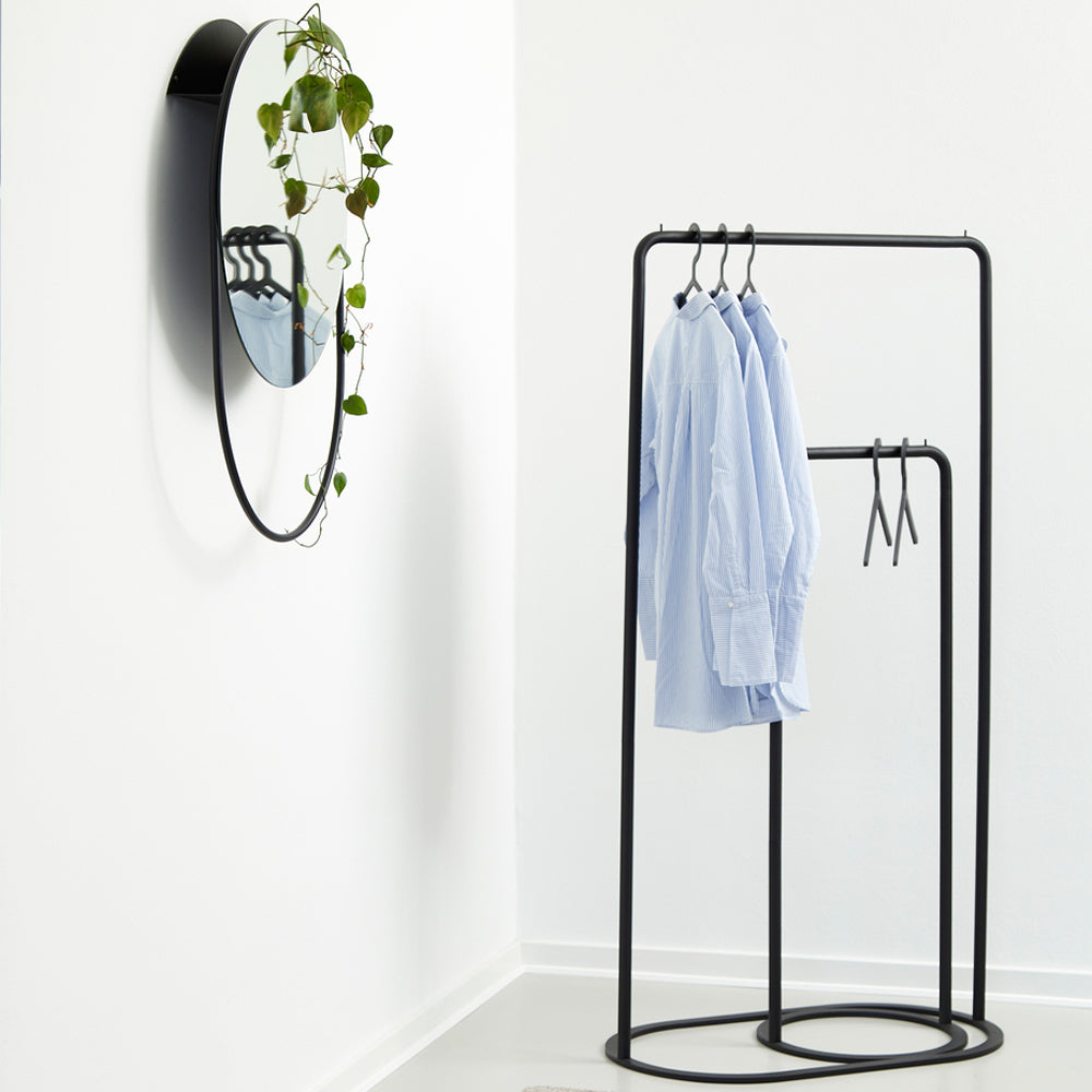 Illusion Hanger by Woud, showing hangers in live shot.