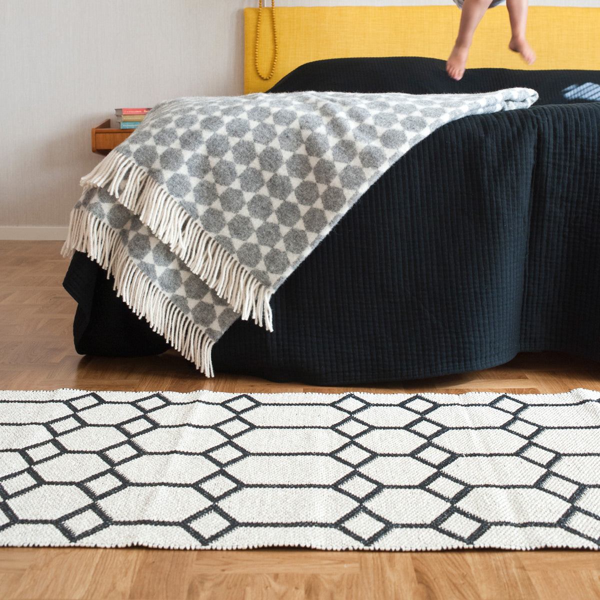 Ingrid Woven Plastic Rug by Brita, showing closeup view of ingrid woven plastic rug in live shot.