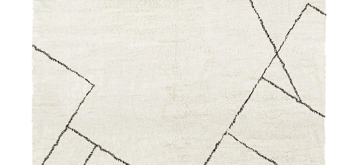 Issy Saville Shaggy IY300 Rug by Second Studio, showing closeup view of issy saville shaggy iy300 rug by second studio in cream & black.