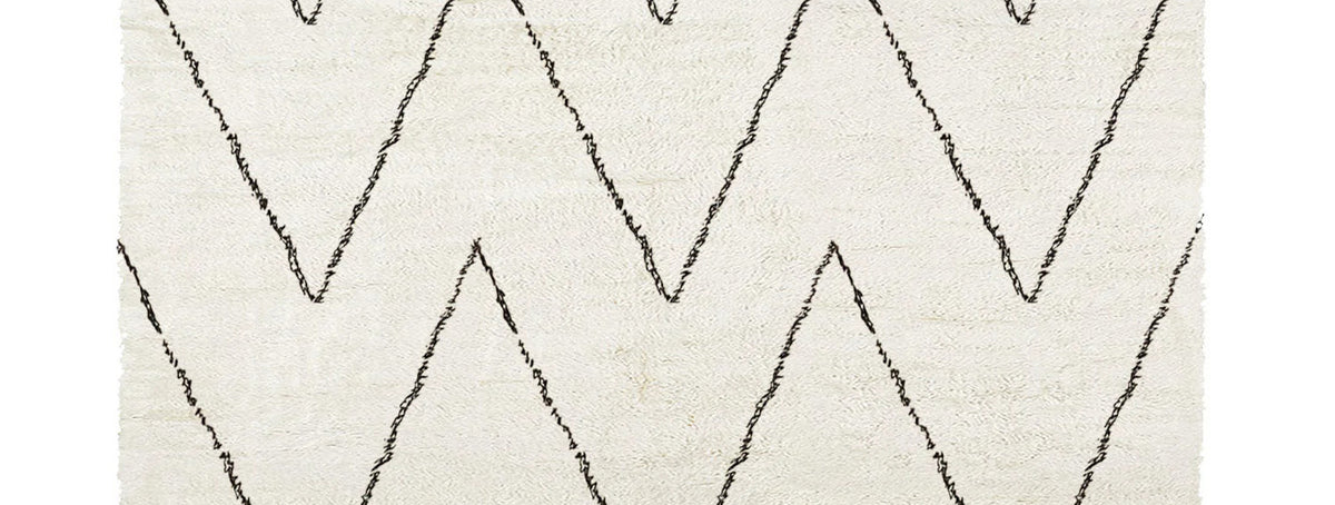 Issy Weiner Shaggy IY400 Rug by Second Studio, showing closeup view of issy weiner shaggy iy400 by second studio in cream & black.
