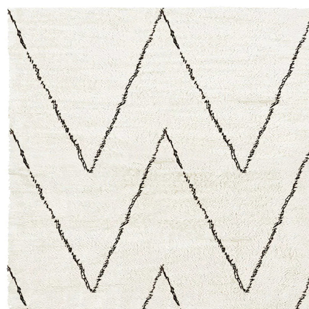 Issy Weiner Shaggy IY400 Rug by Second Studio, showing closeup view of issy weiner shaggy iy400 by second studio in cream & black.