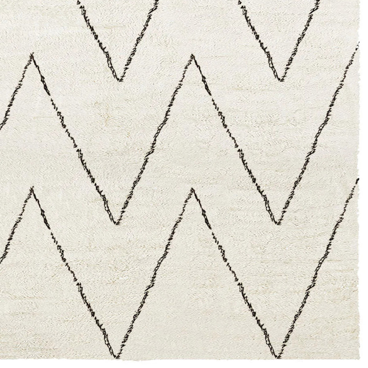 Issy Weiner Shaggy IY400 Rug by Second Studio, showing closeup view of issy weiner shaggy iy400 by second studio in cream & black.