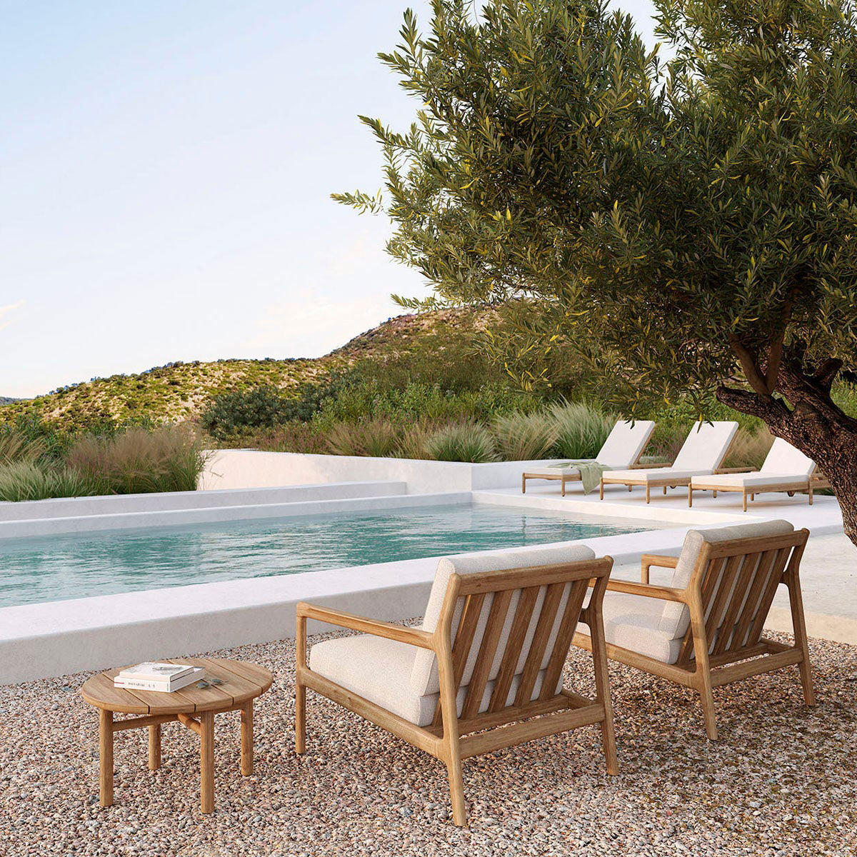 Jack Outdoor Adjustable Lounger by Ethnicraft, showing jack outdoor adjustable loungers in live shot.