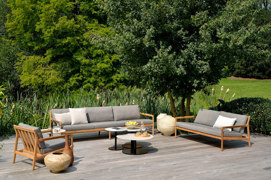 Jack Outdoor Lounge Chair by Ethnicraft, showing outdoor lounge chair, outdoor two seater & outdoor three seater with tables in live shot.