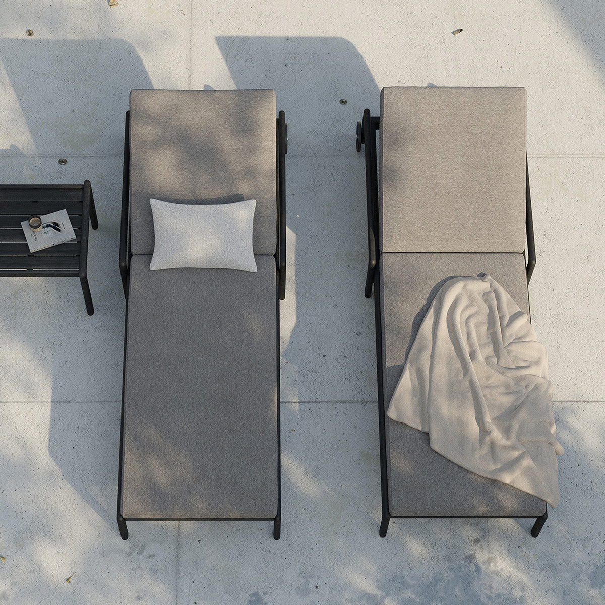 Jack Outdoor Side Table by Ethnicraft, showing top view of outdoor side table in live shot.