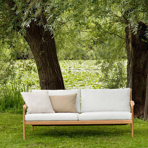 Jack Outdoor Sofa by Ethnicraft, showing jack outdoor sofa in live shot.