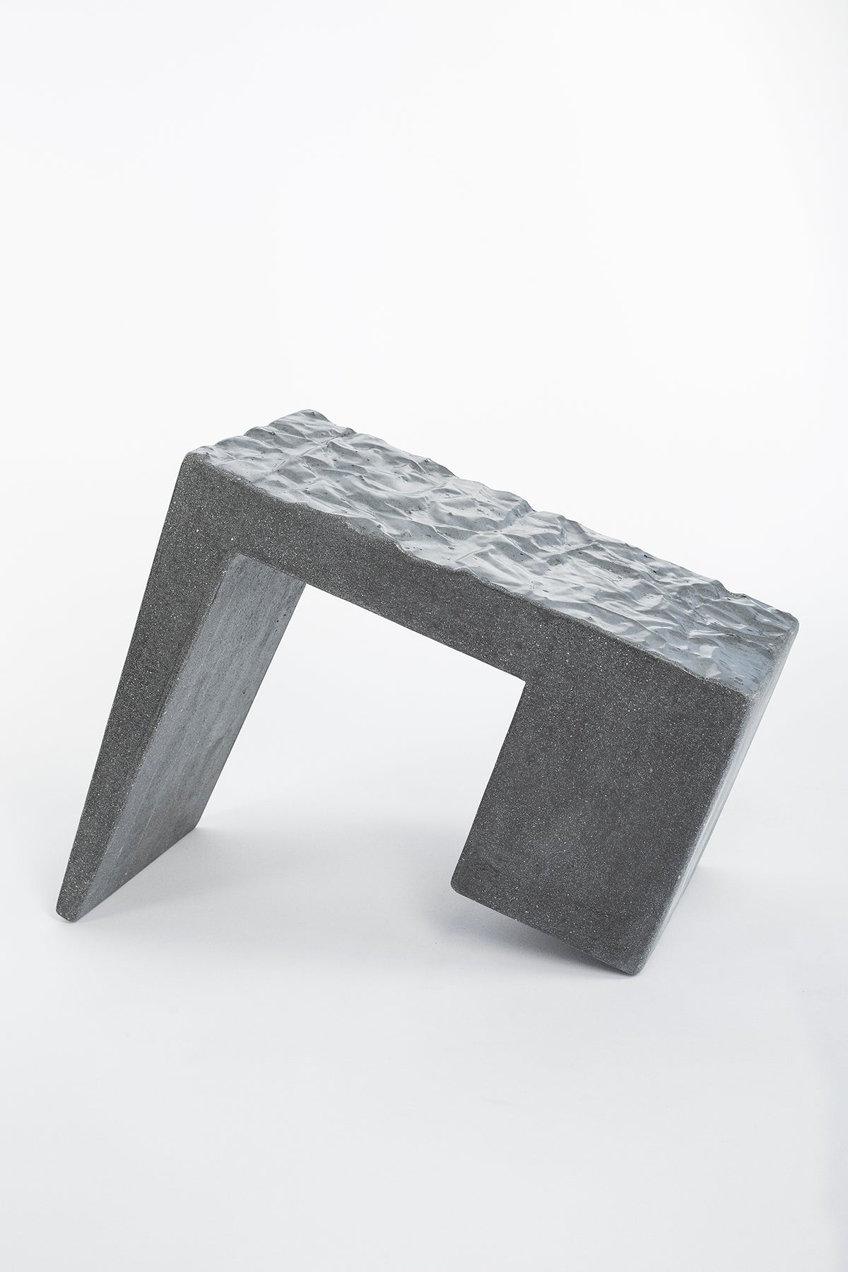 James De Wulf Crumple Block Side Table by De Wulf, showing side view of crumple block side table.