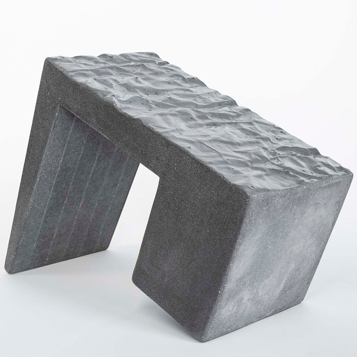 James De Wulf Crumple Block Side Table by De Wulf, showing side view of crumple block side table.