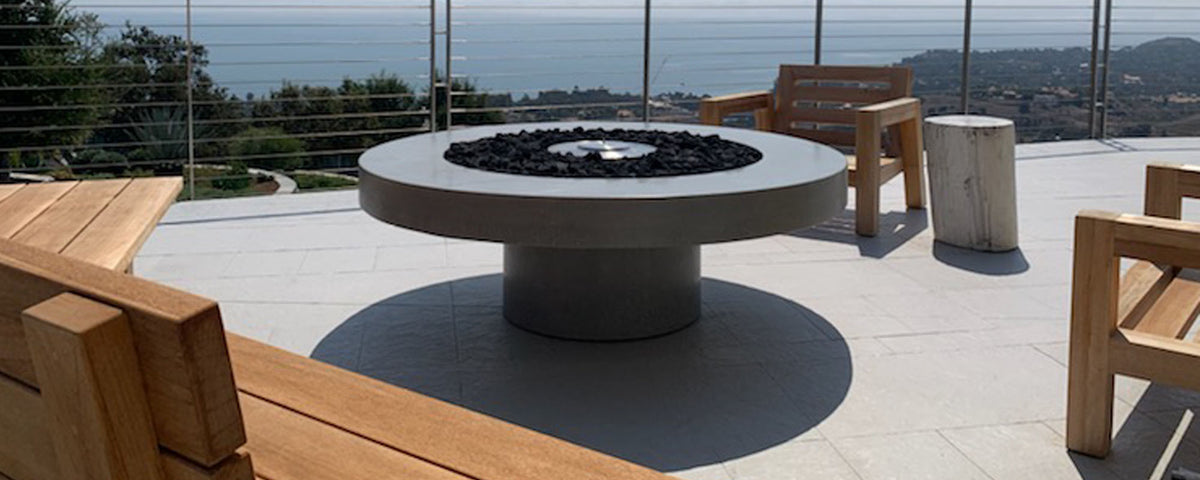 James De Wulf Floating Fire Table by De Wulf, showing floating fire table in live shot.