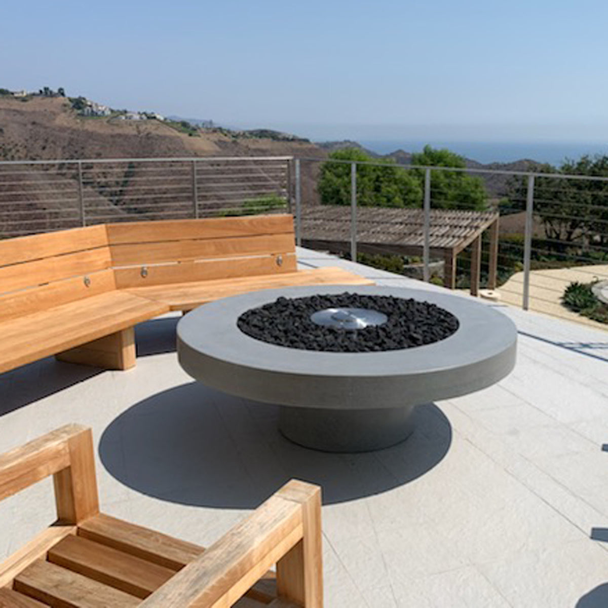James De Wulf Floating Fire Table by De Wulf, showing floating fire table in live shot.