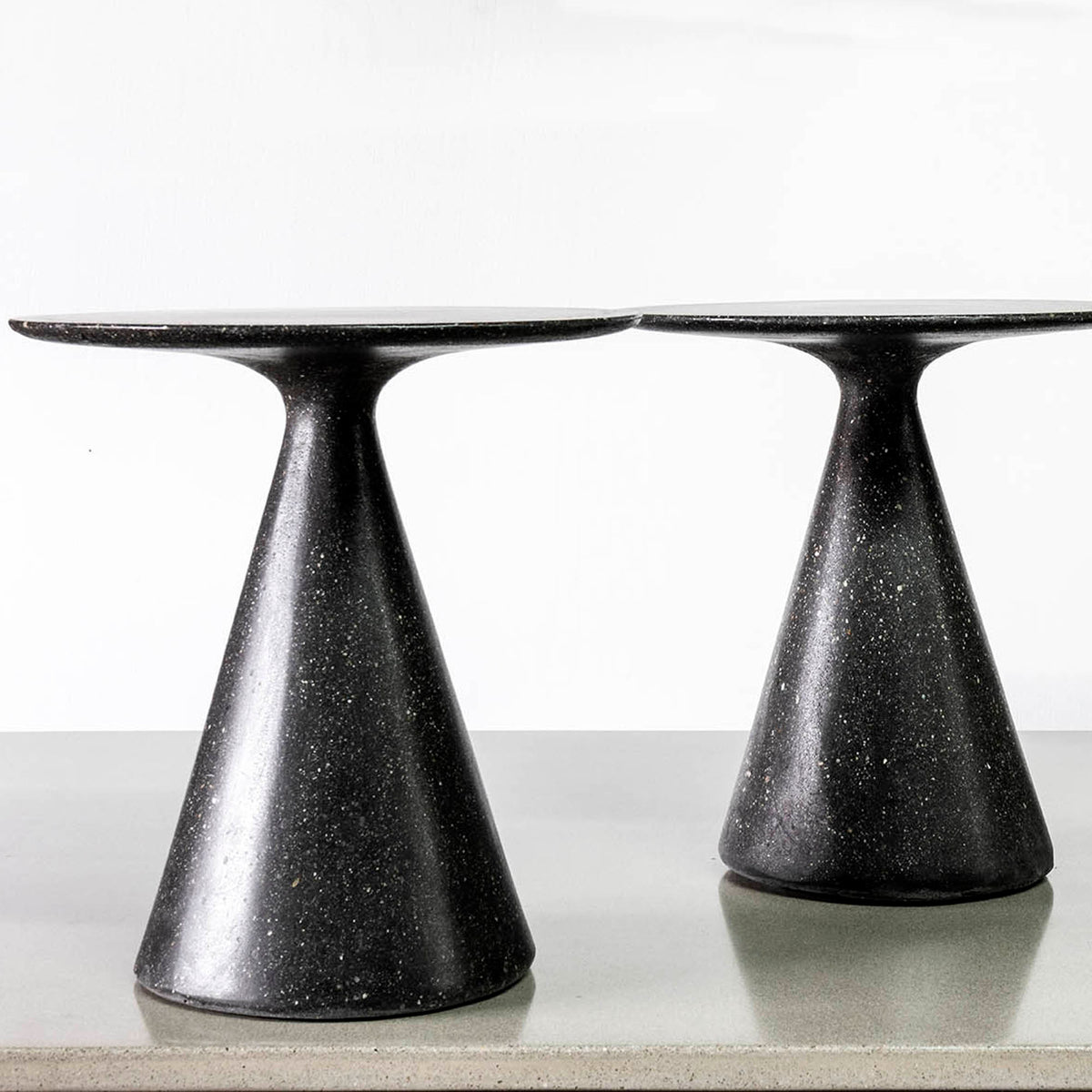 James De Wulf Mini Round Side Table by De Wulf, showing front view of mini round table.