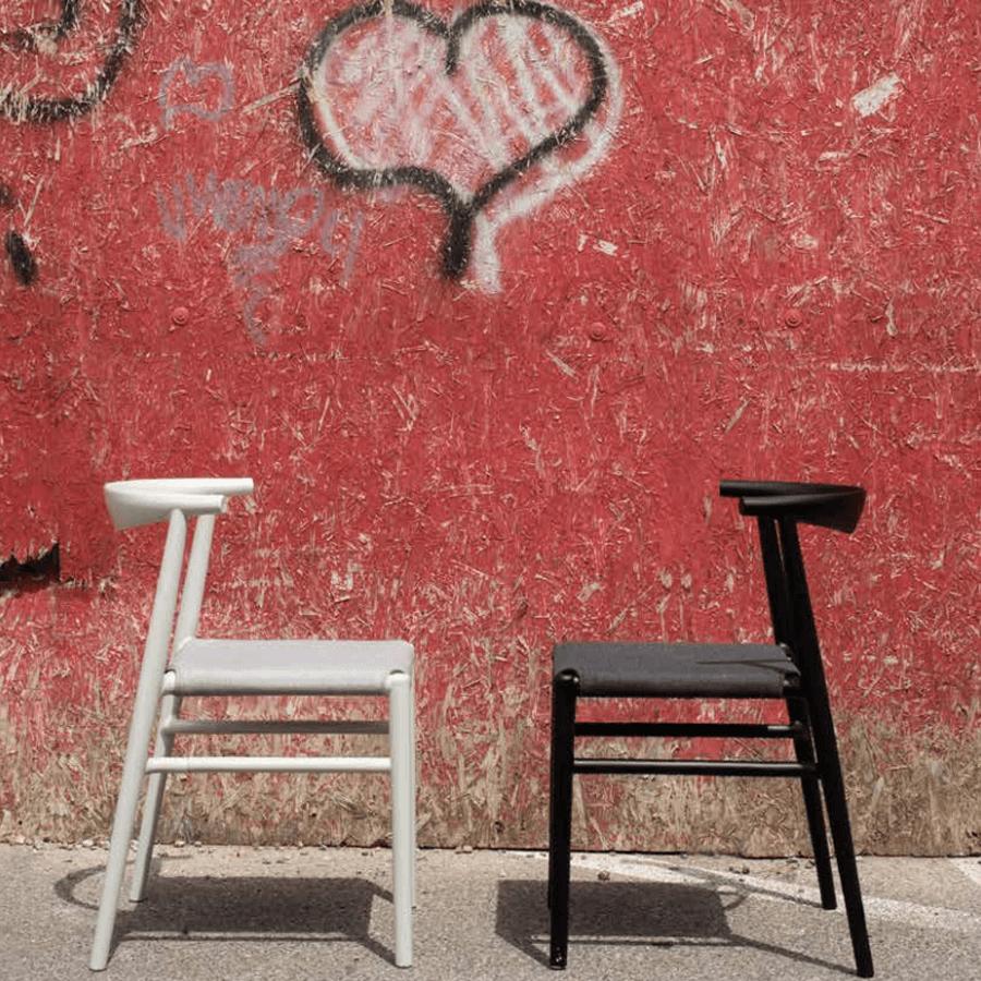 JOI Dining Chair by Toou, showing joi dining chairs in live shot.