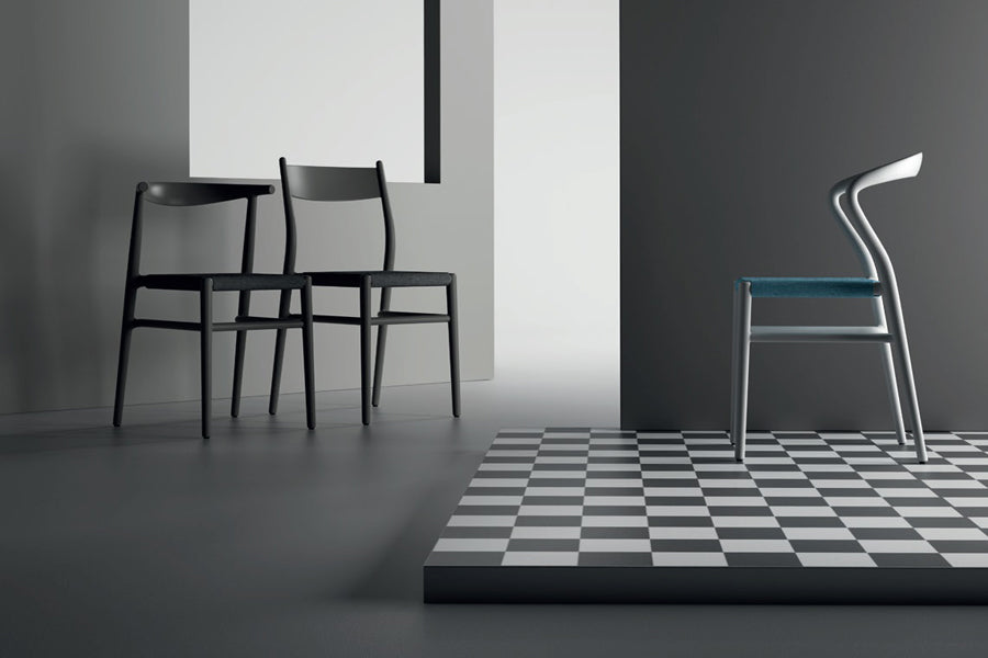 JOI Dining Chair by Toou, showing joi dining chairs in live shot.