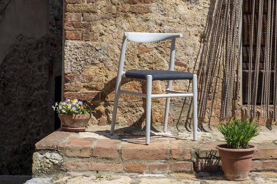 JOI Dining Chair by Toou, showing joi dining chair in live shot.