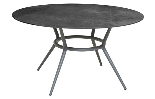 Joy Outdoor Round Dining Table by Cane-Line - Light Grey Powder Coated Aluminum, Black Fossil Ceramic.