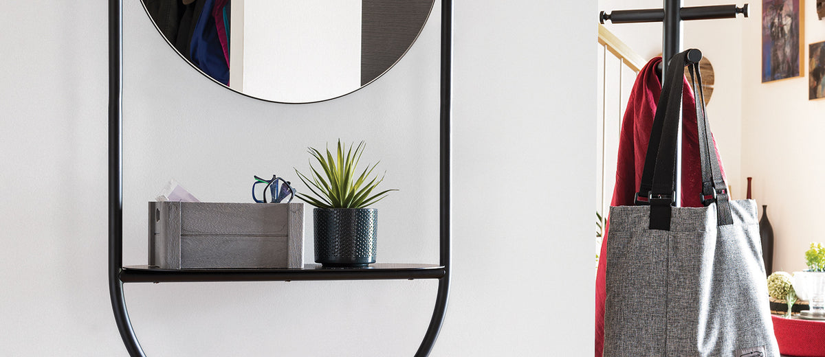 Juno Wall Mirror by Connubia, showing closeup view of juno wall mirror in live shot.