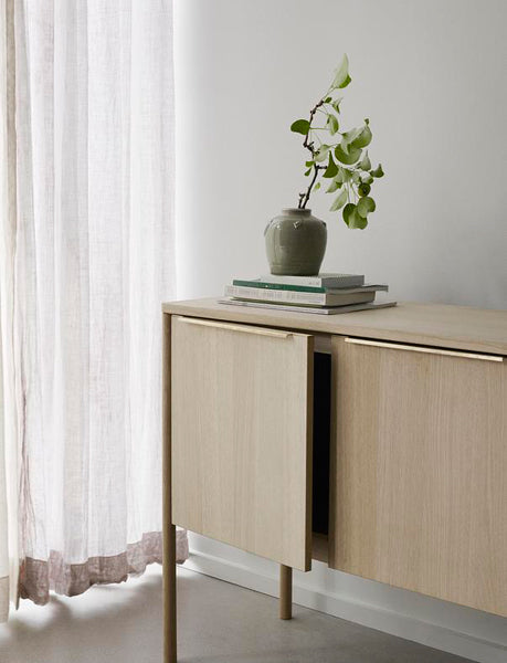 Jut Cabinet by Skagerak, showing closeup view of jut cabinet in live shot.