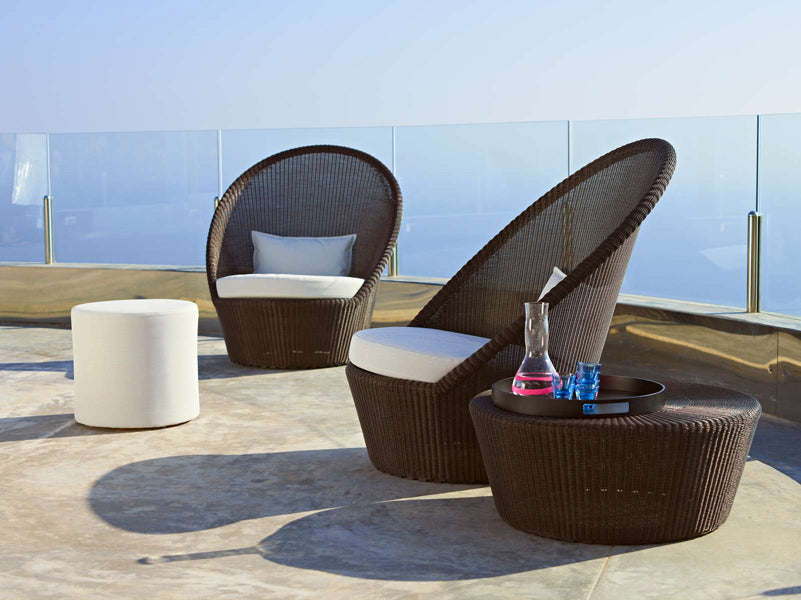 Kingston Sunchair with Wheels by Cane-Line, showing kingston sunchairs with wheels in live shot.