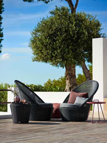 Kingston Sunchair with Wheels by Cane-Line, showing kingston sunchairs with wheels in live shot.