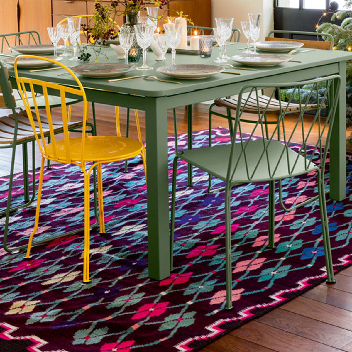 Kintbury Chair by Fermob, showing chairs with table in live shot.