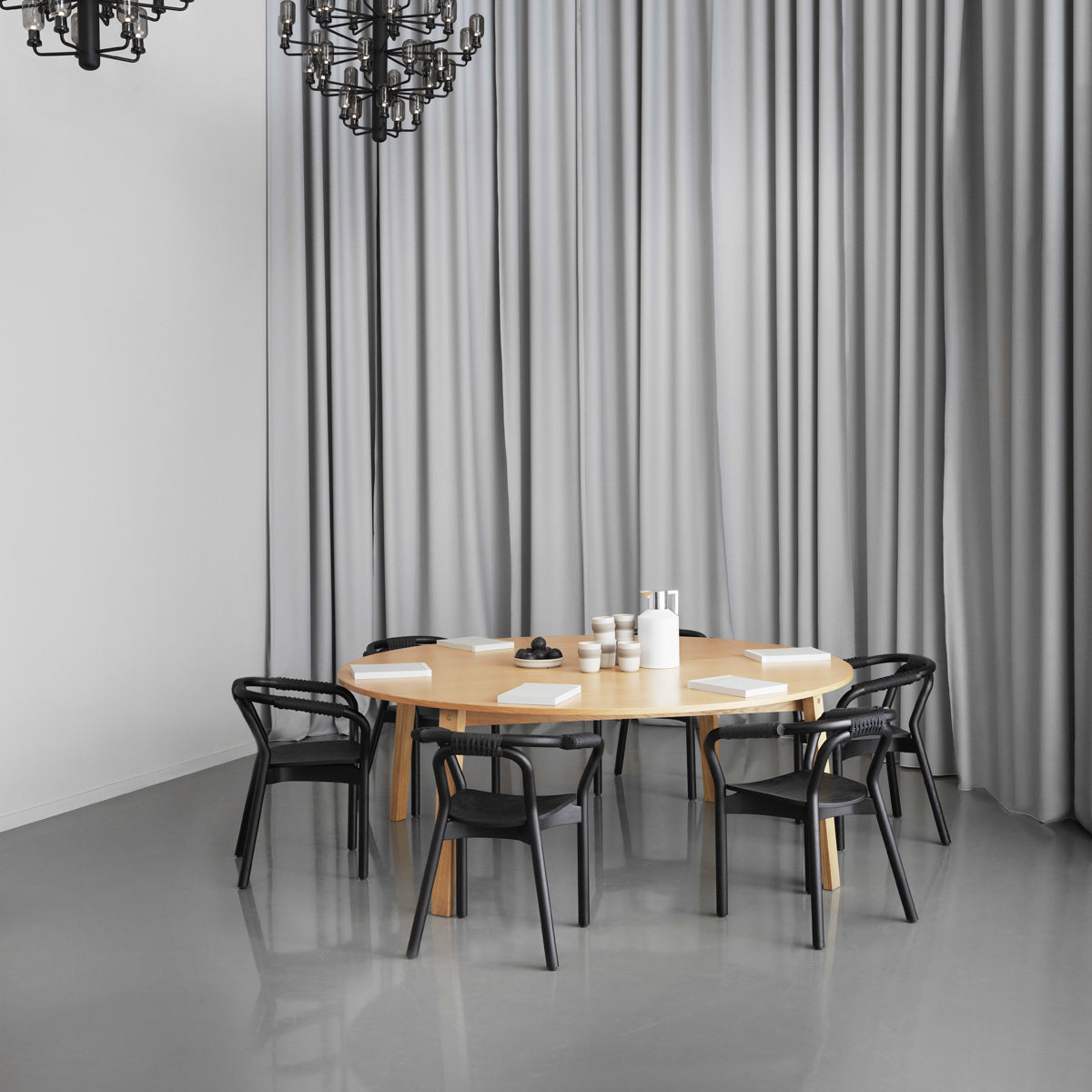 Knot Chair by Normann Copenhagen, showing knot chairs in live shot.