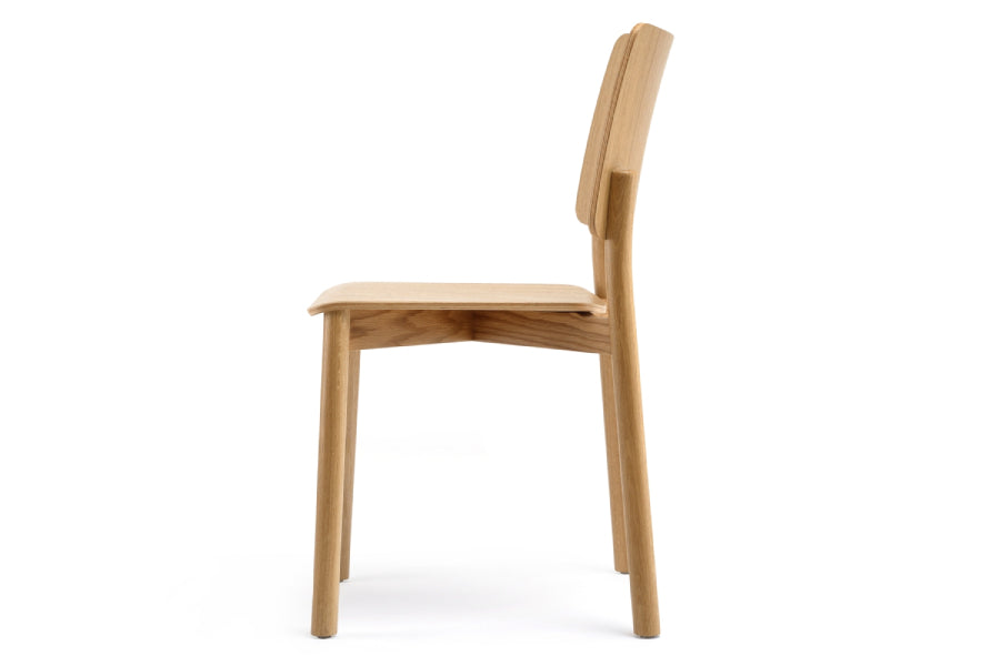 Mia Chair by Kollektiff, showing side view of mia chair.