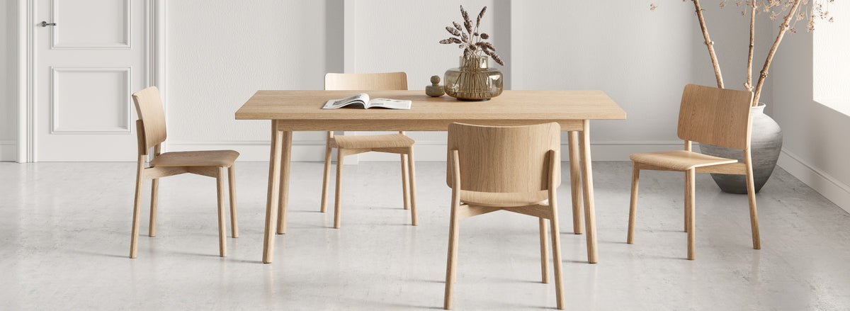 Mia Dining Table by Kollektiff, showing mia dining table in live shot.