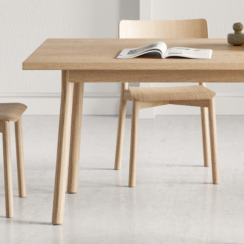 Mia Dining Table by Kollektiff, showing mia dining table in live shot.