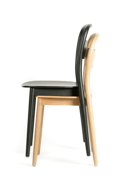 Yue Chair by Kollektiff, showing yue chair in stacked position.