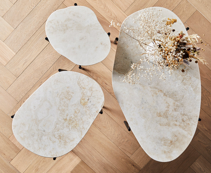 La Terra Occasional Table by Woud, showing la terra occasional tables in live shot.