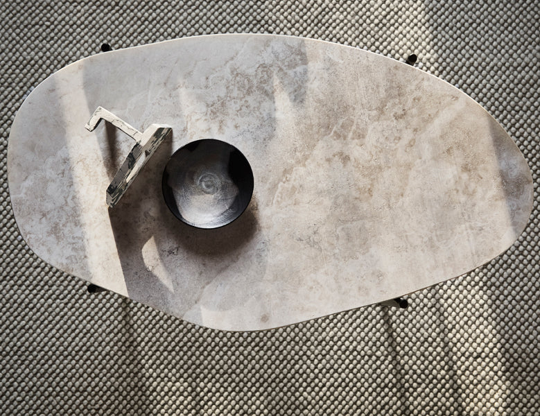 La Terra Occasional Table by Woud, showing la terra occasional table in live shot.