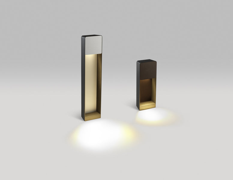 Lab B Bollard Outdoor Light by Marset, showing lab b bollard outdoor lights in live shot.