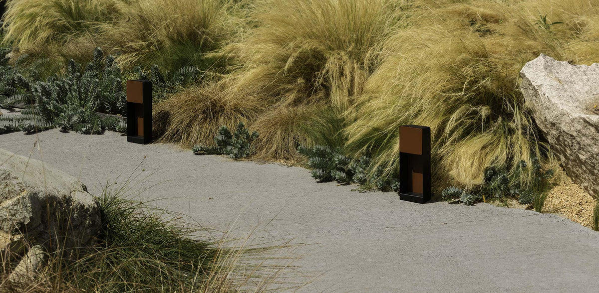 Lab B Bollard Outdoor Light by Marset, showing lab b bollard outdoor lights in live shot.
