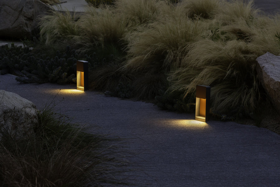 Lab B Bollard Outdoor Light by Marset, showing lab b bollard outdoor lights in live shot.