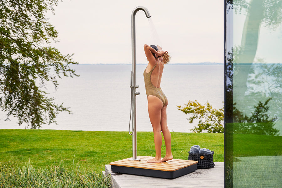 Lagoon Outdoor Stainless Steel Shower by Cane-Line , showing lagoon outdoor stainless steel shower in live shot.
