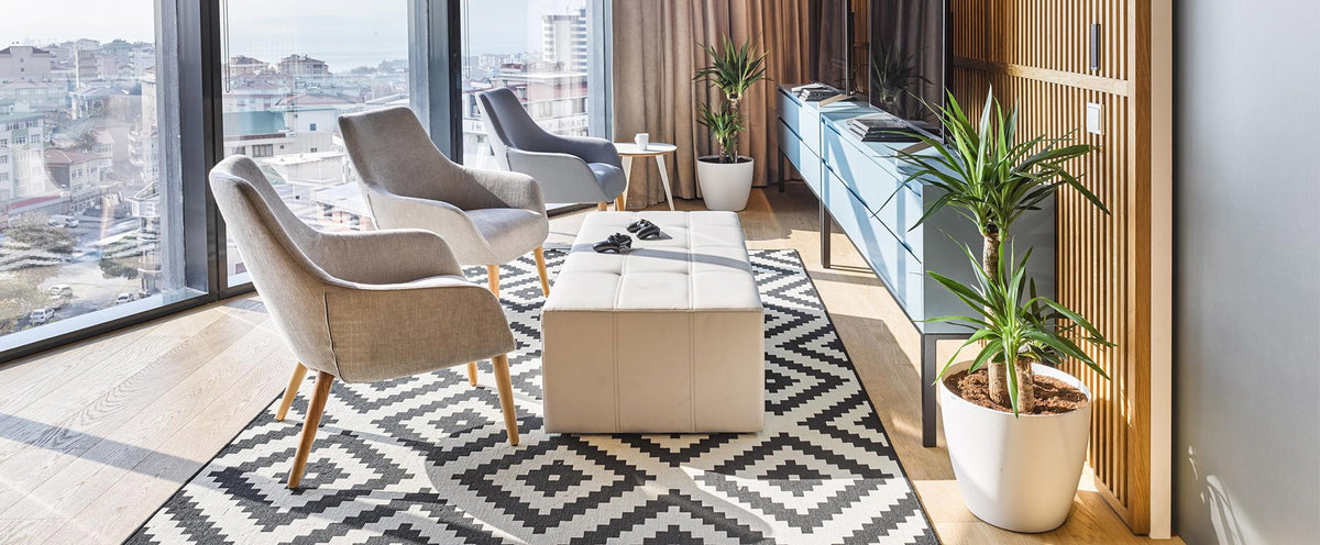 Lamy Dowel Wood Lounge Chair by B&T, showing lamy dowel wood lounge chairs in live shot.
