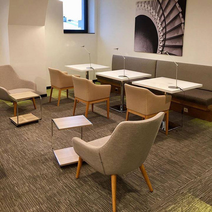 Lamy Dowel Wood Lounge Chair by B&T, showing lamy dowel wood lounge chairs in live shot.