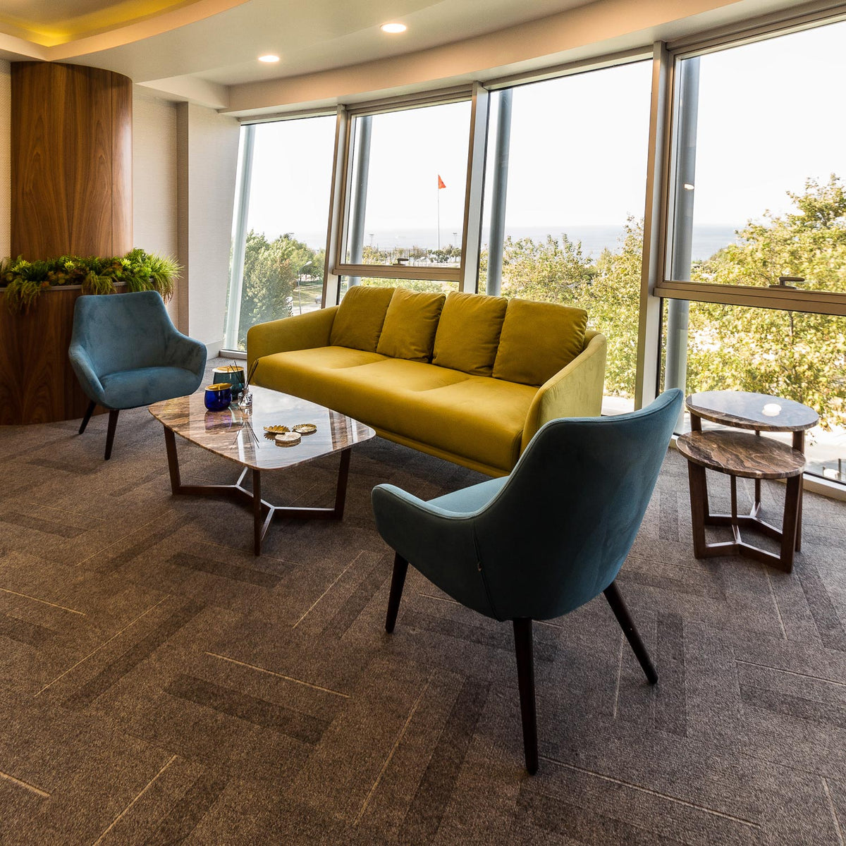 Lamy Dowel Wood Lounge Chair by B&T, showing lamy dowel wood lounge chairs in live shot.