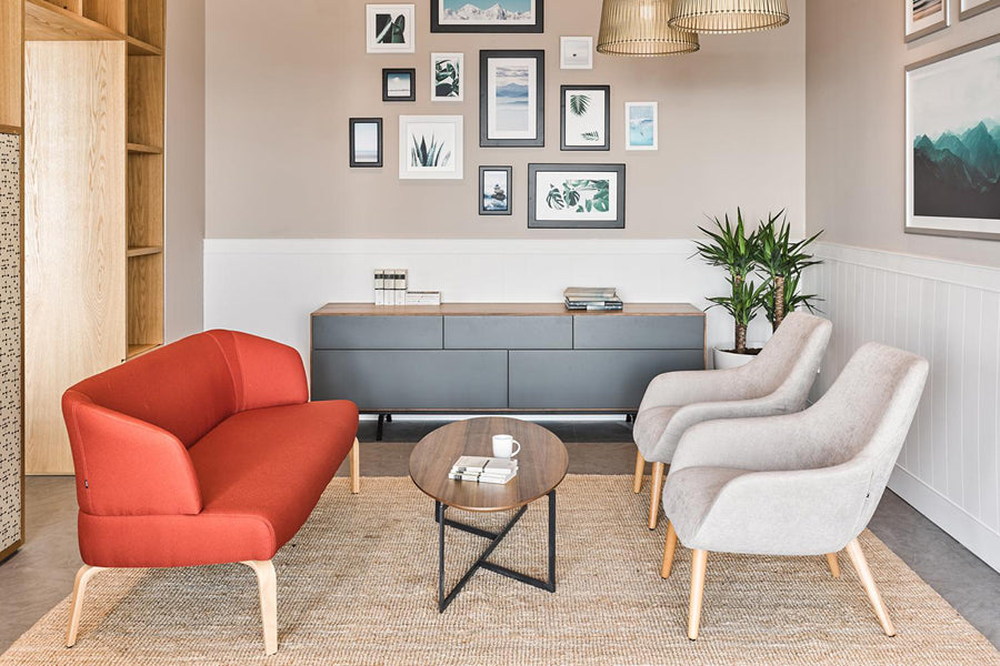 Lamy Dowel Wood Lounge Chair by B&T, showing lamy dowel wood lounge chairs in live shot.