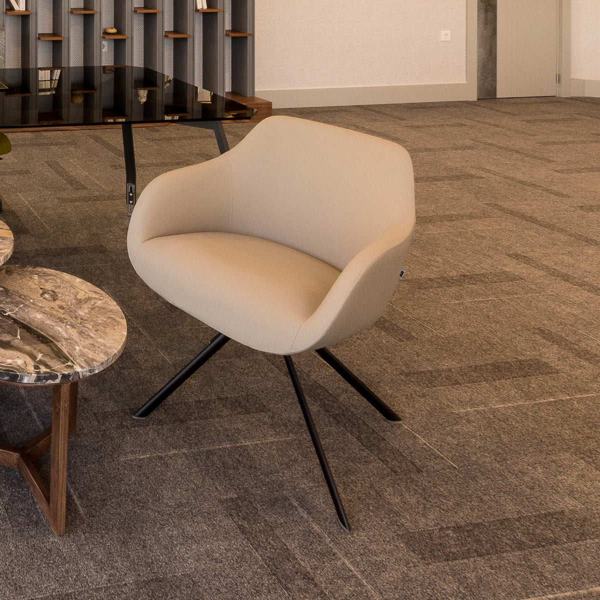 Lamy Ellipse Swivel Metal Chair by B&T, showing lamy ellipse swivel metal chair in live shot.