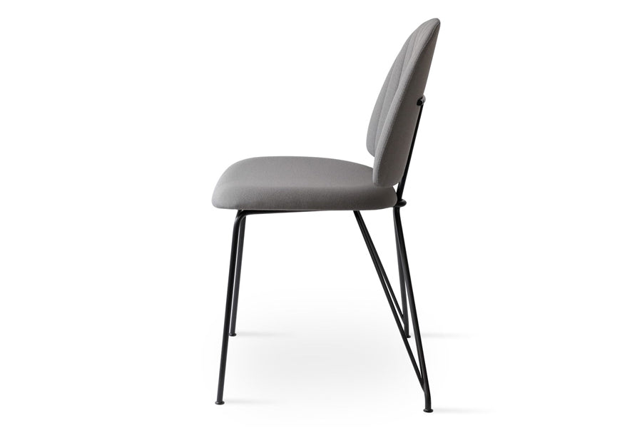 Langham Soft Seat Dining Chair by SohoConcept, showing side view of soft seat dining chair.