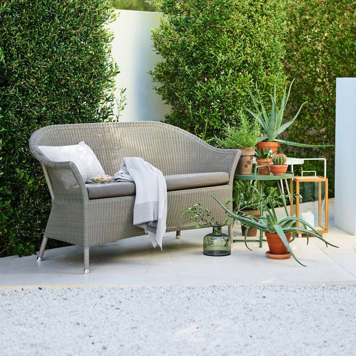 Lansing 2-Seater Sofa by Cane-Line, showing lansing 2 seater sofa in live shot.