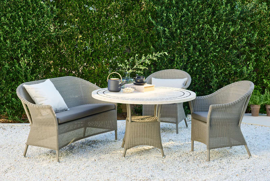 Lansing Dining Armchair by Cane-Line, showing lansing dining armchairs in live shot.