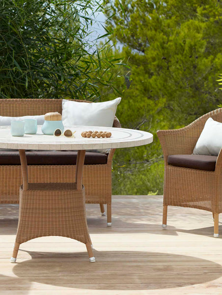 Lansing Dining Armchair by Cane-Line, showing lansing dining armchair in live shot.
