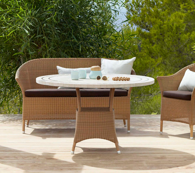 Lansing Table by Cane-Line, showing lansing table in live shot.