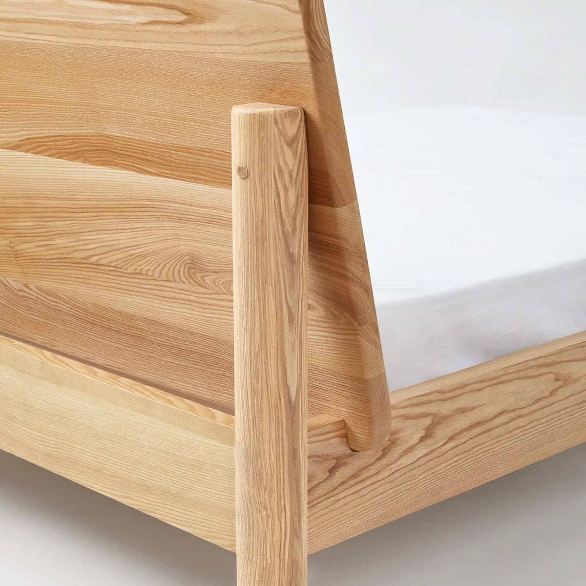 LAX Milk Bed by MASHstudios, showing closeup view of lax milk bed in solid ash wood.