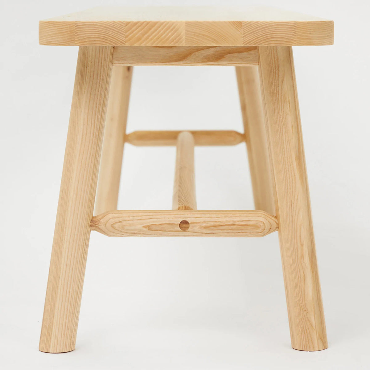 LAX Milk Bench by MASHstudios, showing side view of lax milk bench in solid ash wood.