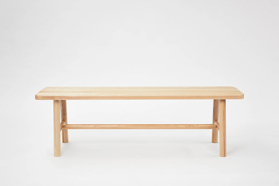 LAX Milk Bench by MASHstudios, showing front view of lax milk bench in solid ash wood.